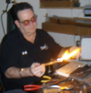 Herb Duncan making a sculpture